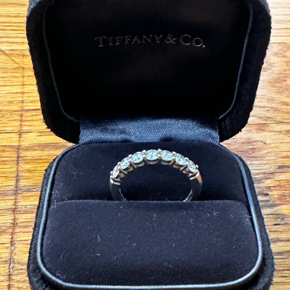 Tiffany 7 stone engagement ring, size 4. Tiffany forever half circle diamonds.